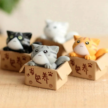 Kawaii Cat Ornaments Delight by KittyNook Cat Co.: four mini kittens in boxes, cute decor for any nursery or cat lover.